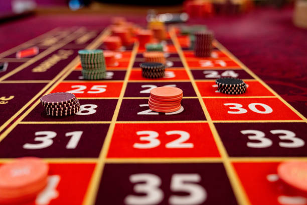 Live casino dealer at blackjack table with multiple camera angles